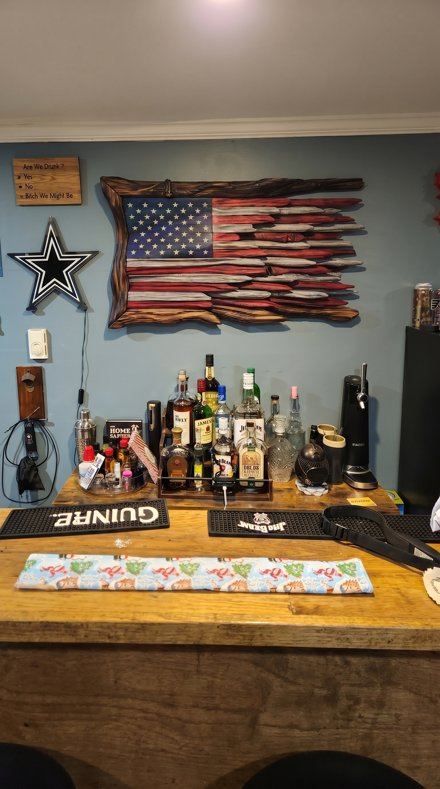 Wood flag displayed above a home bar